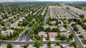 Aerial view of suburban homes and streets.