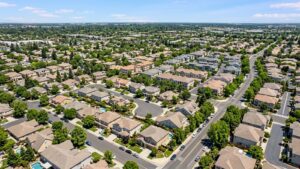 Aerial view of suburban neighborhood with houses.