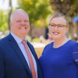 Steve and Heather Ostrom with Coldwell Banker going over real estate education
